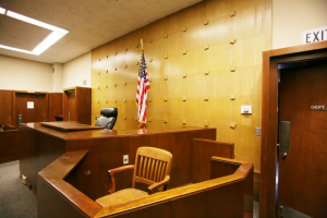 Image of empty courtroom with witness stand